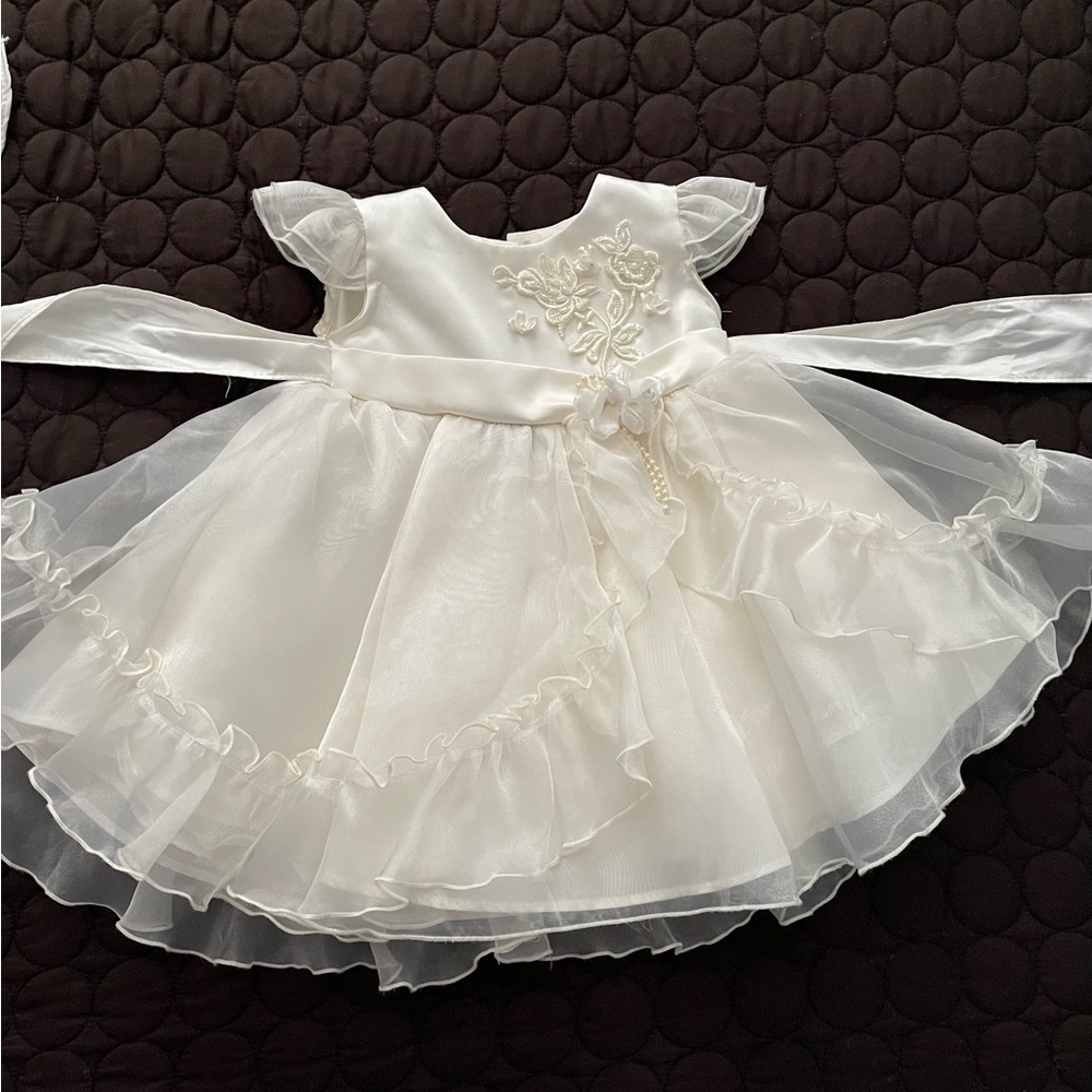 Girl 12 months 4 dresses and 1 Romper all for $61